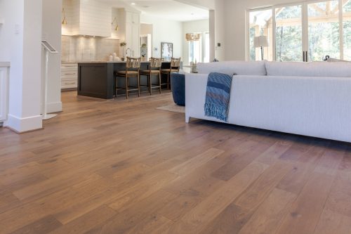 Beautiful hardwood flooring in a contemporary living space with natural light.