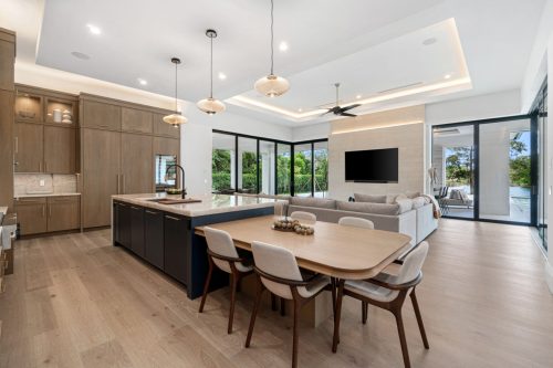Serene kitchen blending organic and modern accents, featuring European White Oak flooring.