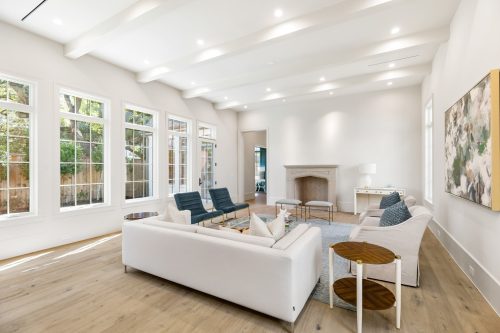 Cozy, neutral living room in Houston home with european white oak flooring.