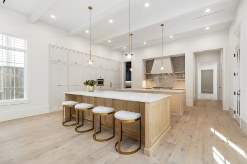 Bright, light-filled kitchen with warm color tones and European white oak flooring.