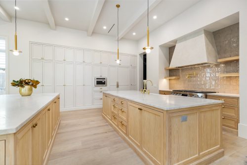 European white oak flooring ground neutral kitchen in Houston home.