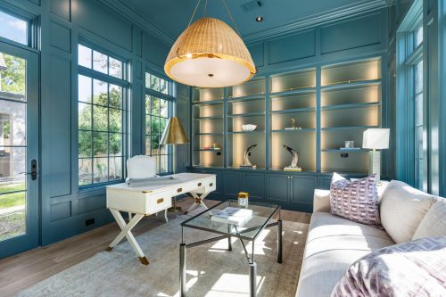 Saturated blue study with neutral toned accents and european white oak flooring
