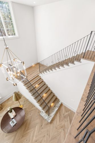 Staircase in Houston home made with Vintage Loft Bowery.