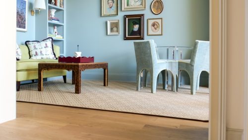 Robin’s egg blue snug room with Eighteen Seventy-Five white oak flooring and built-in shelving