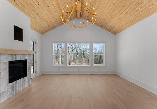 Open entertaining space with Silvian Laakso-Valley hardwood flooring in a custom Davidson home designed for gathering and family living.