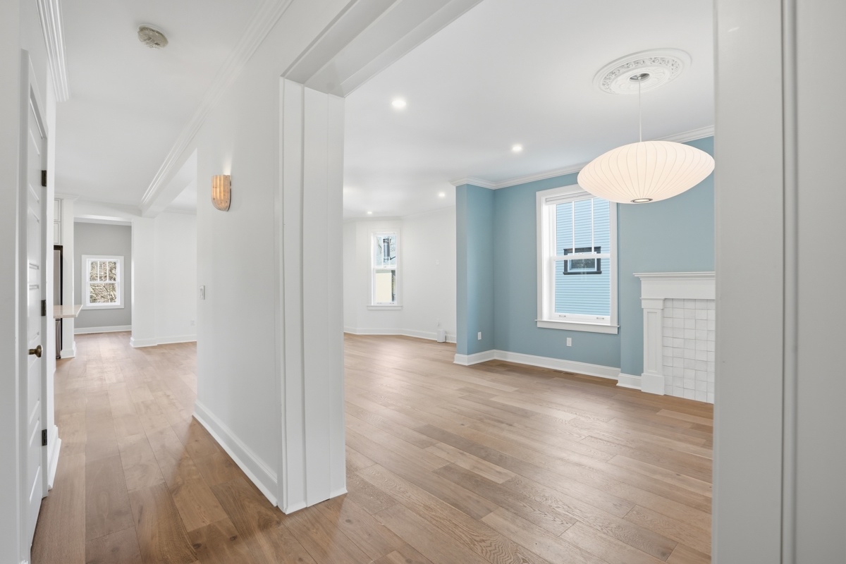 Open main level with Silvian Luonto flooring and bright light