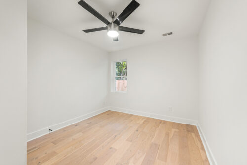 Charlotte, NC bedroom with wide plank hardwood flooring