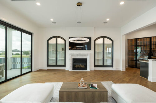 Modern living area with Killarney Parkfield flooring and black window detail