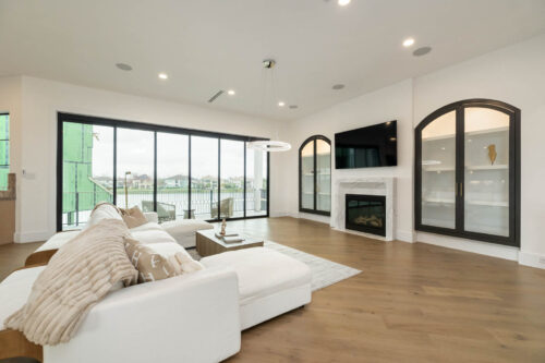 Houston-area home living space with Real Wood Floors wide plank oak flooring and open layout