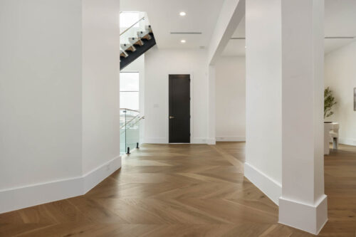Entryway with chevron white oak flooring made with Killarney Parkfield