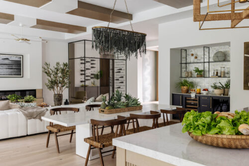 Park Shore living space with wood flooring and layered natural materials