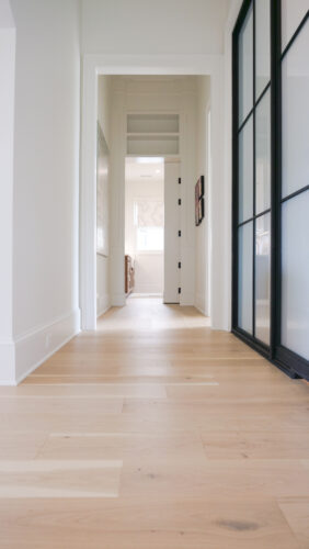 Open hallway design showcasing Silvian Tuuli European white oak floors