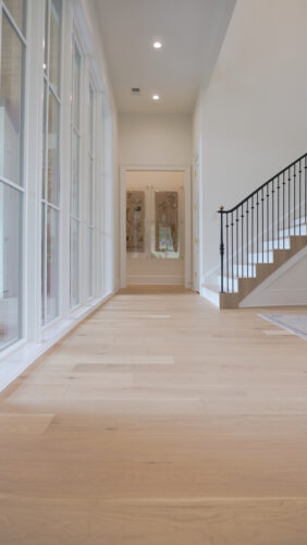 Memphis luxury home entry with bespoke architecture and natural oak flooring