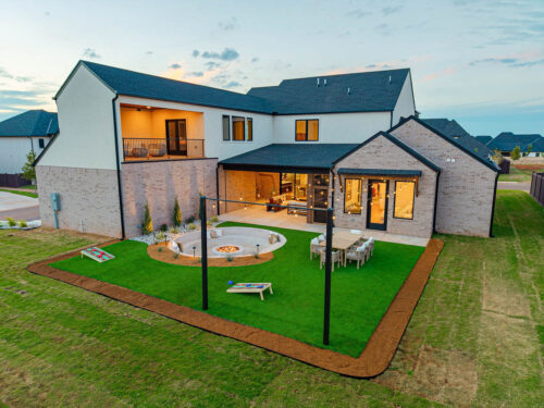 Oklahoma City new build by Crabtree Homes featuring a modern residential backyard design