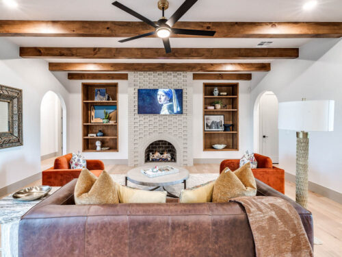 Battersea European White Oak flooring in a light-filled living room with exposed wood beams