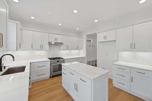 Lily Pond Watersafe flooring flowing through a bright modern kitchen