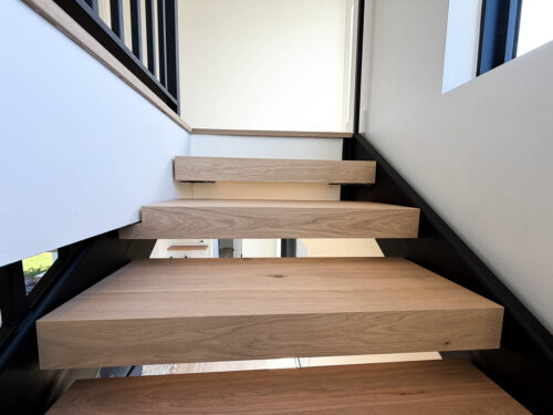 FloorMade floating treads made with Real Wood Floors wide plank European white oak flooring in a Bozeman, Montana home.
