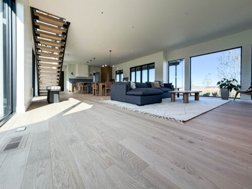 Wide plank European white oak flooring by Real Wood Floors in a Bozeman living room.