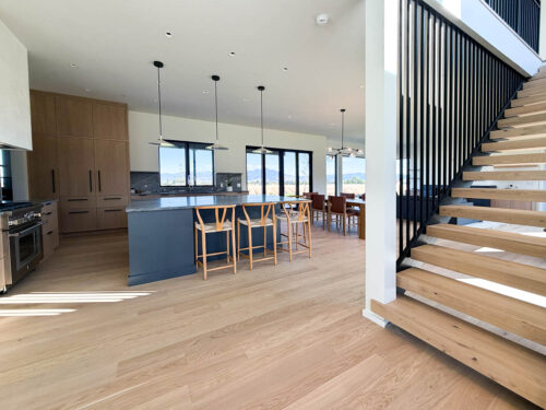 Kitchen interior featuring wide plank European white oak from Real Wood Floors in Bozeman.