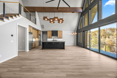 Spacious cabin interior with layered textures and grounding wood-look floors