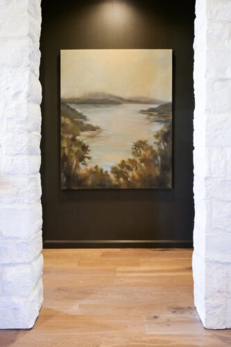 Silvian Luonto wide plank European white oak flooring framed by white stone archways in a Collierville, TN home.